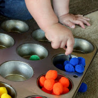 Use pom poms for fine motor activities