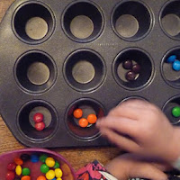 Sort small pieces of candy for fine motor skills