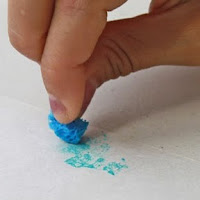 Paint with mini sponges for fine motor skills