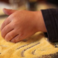 Corn Meal Sensory Activity for Toddlers