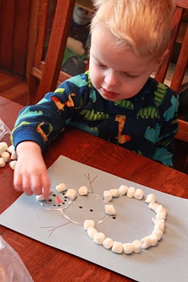 Marshmallow Snowman Craft for kids to make in the winter and work on fine motor skills.