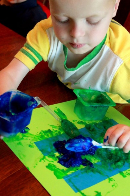 Create your own tape resist letters or designs using homemade edible finger paint