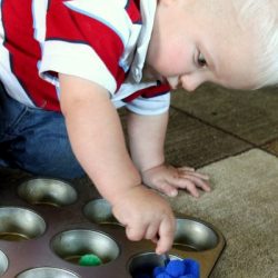 fine motor play with pom poms for toddlers