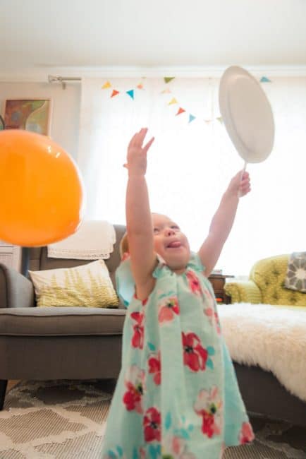 Play a game of balloon badminton with your toddler -- so much fun!