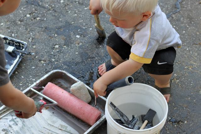 Try painting the driveway for a quick and easy summer activity!