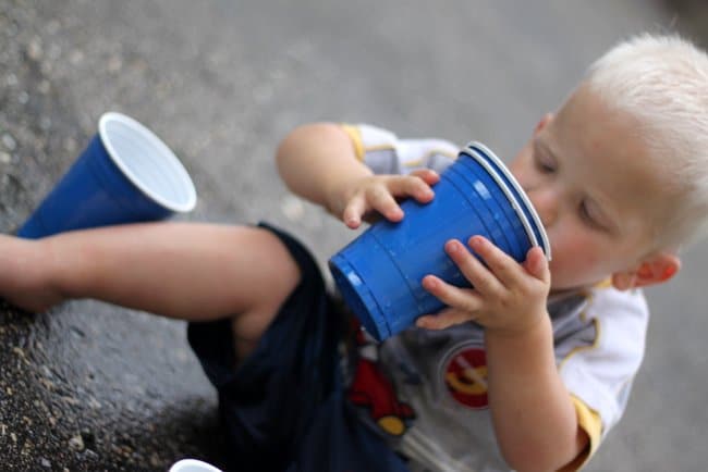 Sneaky way to get kids to drink water outside on a hot summer day.