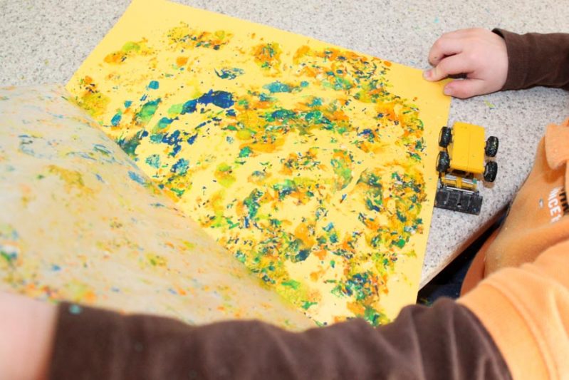 Melted crayon canvas art. Painted light yellow base. Peeled paper off  crayola crayons. Glued with craft glue.…