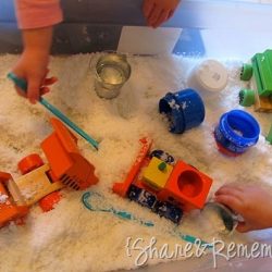 Make a snowy construction site sensory tub with this idea from Things to Share & Remember