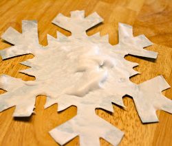 Make fun snowflakes with snow paint, from Mom Endeavors