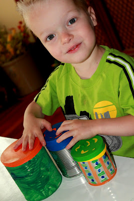 Make easy and colorful DIY tin can drums with your preschooler