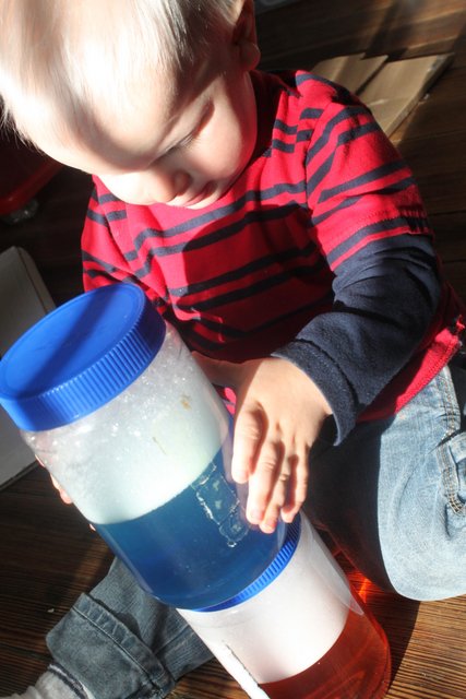 A sensory activity for toddlers - stacking soapy sensory jars