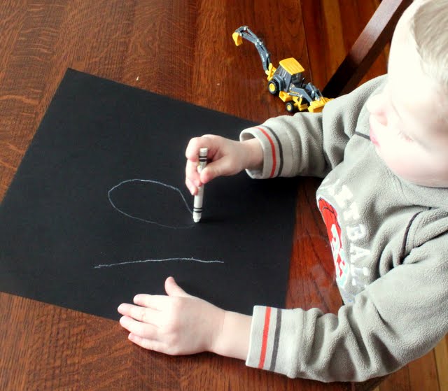 Start your art project by writing or drawing a simple number, like 100, or a simple shape.