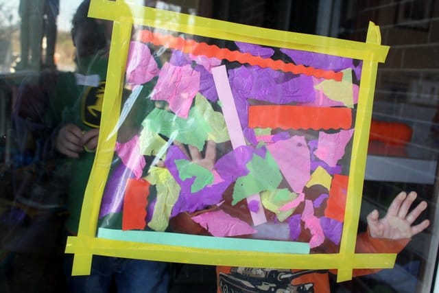 A creative collage for Easter makes a colorful window decoration for spring.