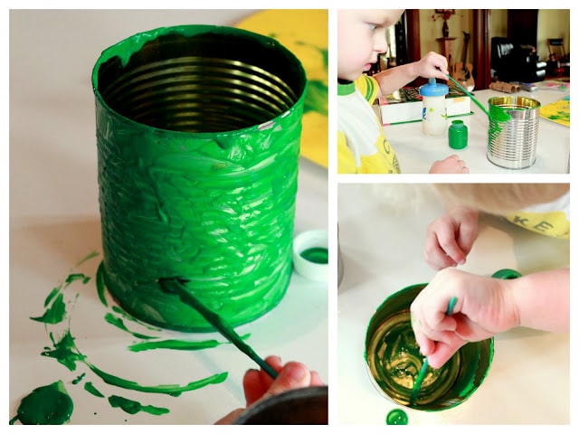 Paint the cans with your preschooler to make the tin can drums together
