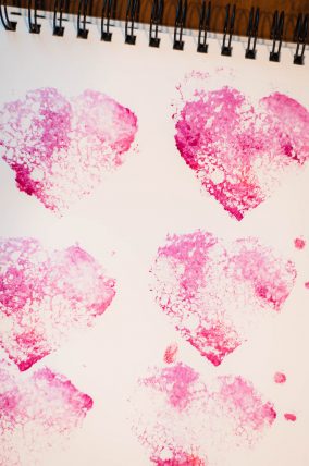 Sponge paint hearts for a fun Valentine's Day art activity