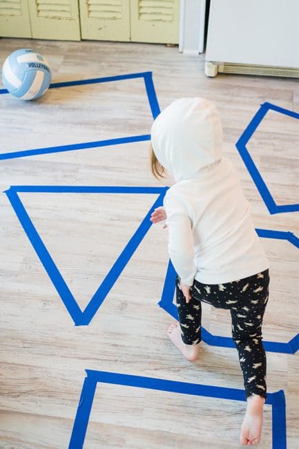 Just a little tape and a ball make for a fun shapes learning activity!