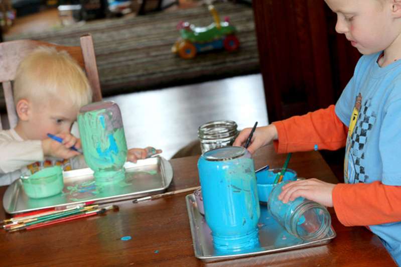 The kids painting and learning how to tint glass Mason jars