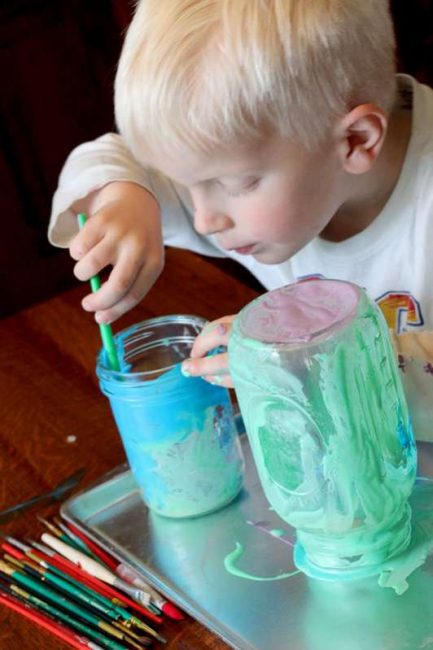 Paint the glass Mason jars with colored glue (inside or out!)