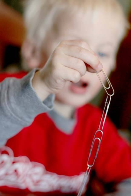 Paper Clips. Paper clips are great for little hands and take kids time to clip together. They can make a chain, or a necklace, as long as they like!