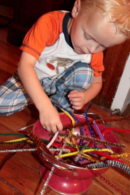 Just pipe cleaners and a colander - such a simple fine motor activity for toddlers to try.