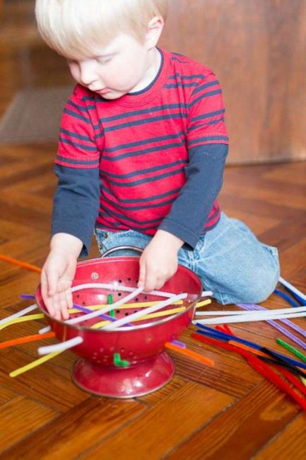 Push, thread, pull, and repeat! Louis had so much fun with this independent busy play activity!