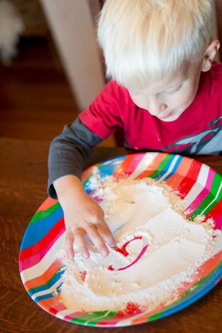 Making marks in flour for prewriting -- simple practice for preschoolers!