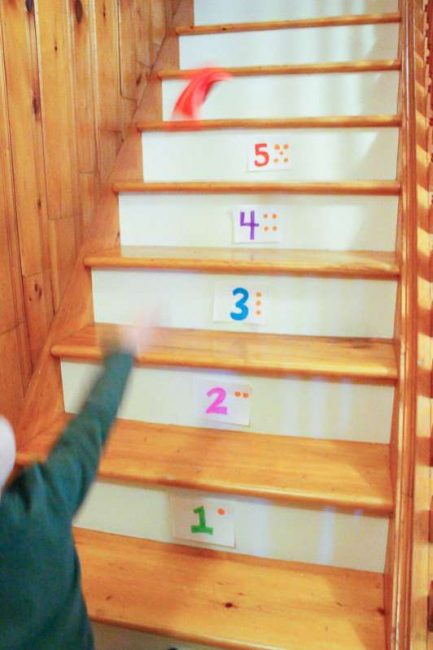 A simple bean bag number toss on the stairs is a great activity for preschoolers!