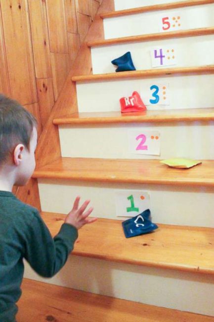 A simple bean bag number toss on the stairs is a great activity for preschoolers!