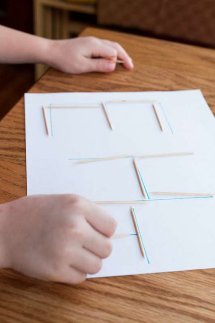 Tracing letters with toothpicks