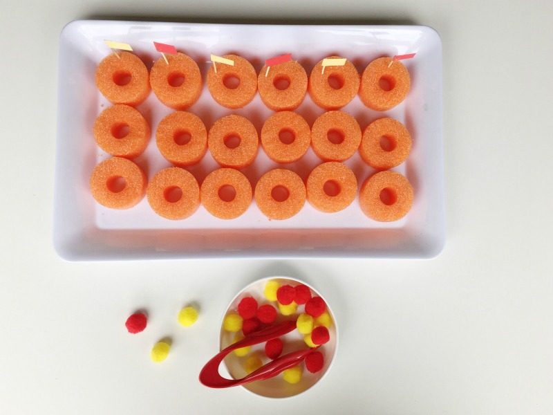 Make a pool noodle fine motor tray to practice fine motor skills!