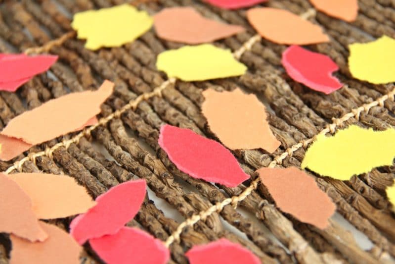 Kids can tear paper to make leaves for a Fall Tree Craft.