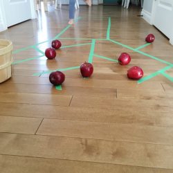 Apple tree picking activity that's great for gross motor skills