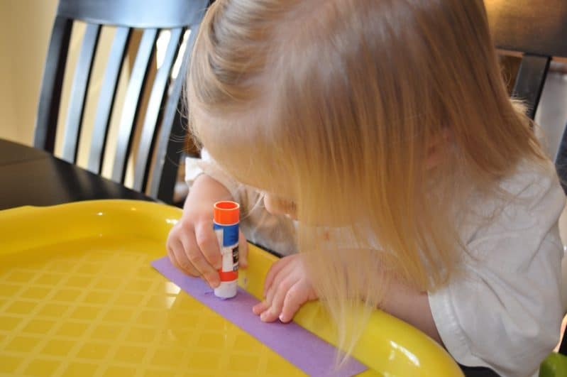 Use simple shapes to build your own menorah Hanukkah craft!