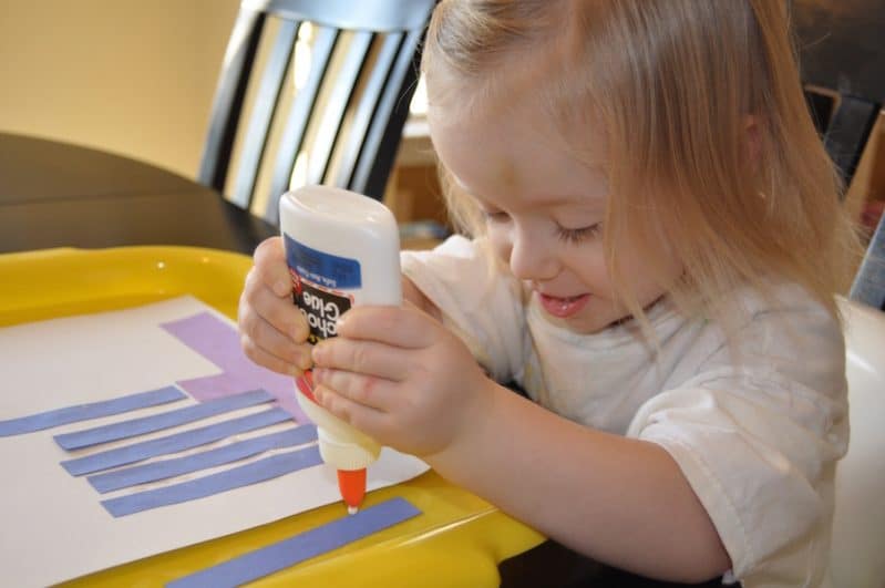 Use simple shapes to build your own menorah Hanukkah craft!