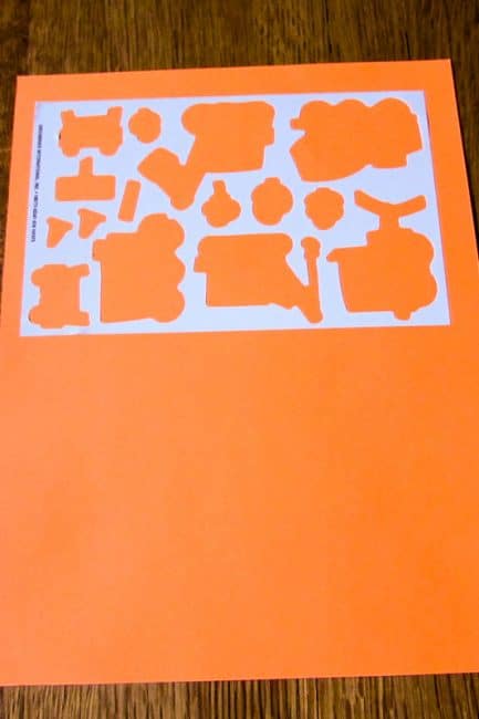 Make an easy sticker puzzle your kid can use again and again!