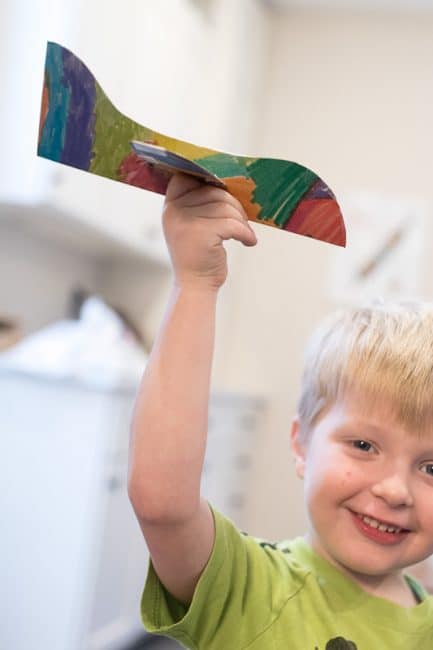 Make a fun airplane craft for pretend play with your kids with supplies you already have at home!