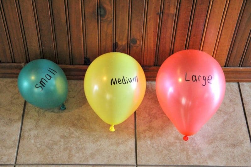 Such a silly gross motor balloon activity that gets kids bouncing, jumping, and rolling on balloons!