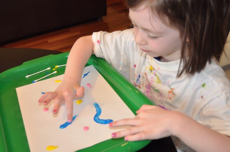 This painting activity is super easy to set up and flexible to fit multiple aged kids.