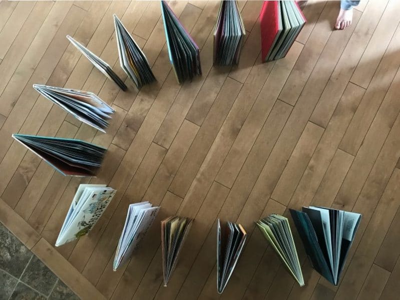 Cute way to bring more fun with books! And uneven book trail with a built-in domino effect