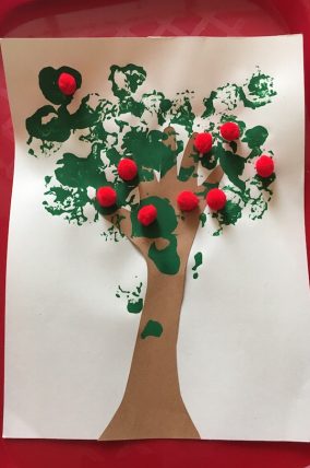 This Handprint Apple Tree craft is a super simple way to welcome fall!