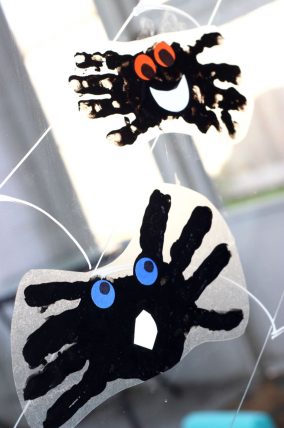 Make a spider handprint window cling with with the kids! Such a cute Halloween decoration!