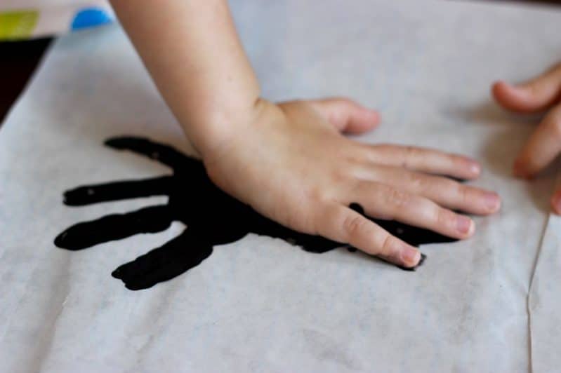 Get the whole family involved in decorating the windows with some not-so-spooky spider handprint window clings!