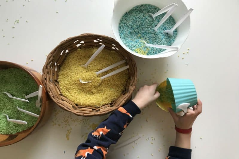 Invite your child to pour, scoop, and play with the rice after the matching is complete