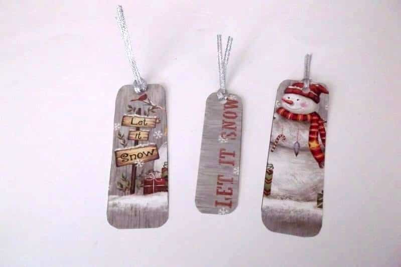 Turn Christmas cards into bookmarks for an easy gift kids can make!