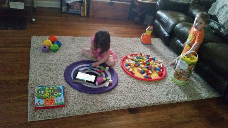Member of the Month Heather's children discover new toys with her simple corners trick.