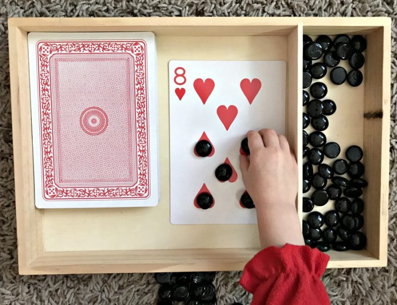 Use jumbo playing cards for extra large fun with this card counting math activity