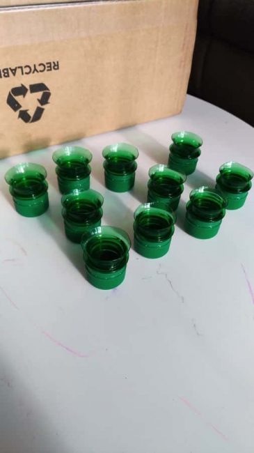 Use bottle tops and caps to build a number matching box