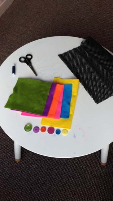 Practice matching and fine motor skills with a color matching mat for toddlers