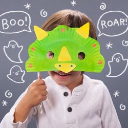 Use a paper plate to make a dinosaur mask from Mom.me