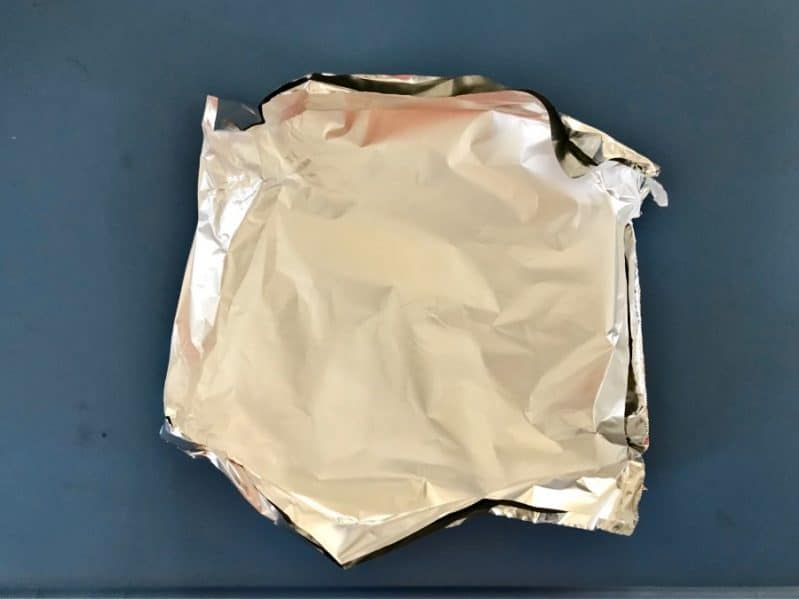 Scrunching aluminum foil for your book based science experiment is a great fine motor skill!